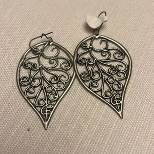 Handcrafted antique silver tone earrings.